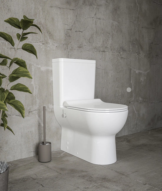 SuVit Bestseller Stand-WC mit Spülkasten in modernem Design vor grauer Betonwand